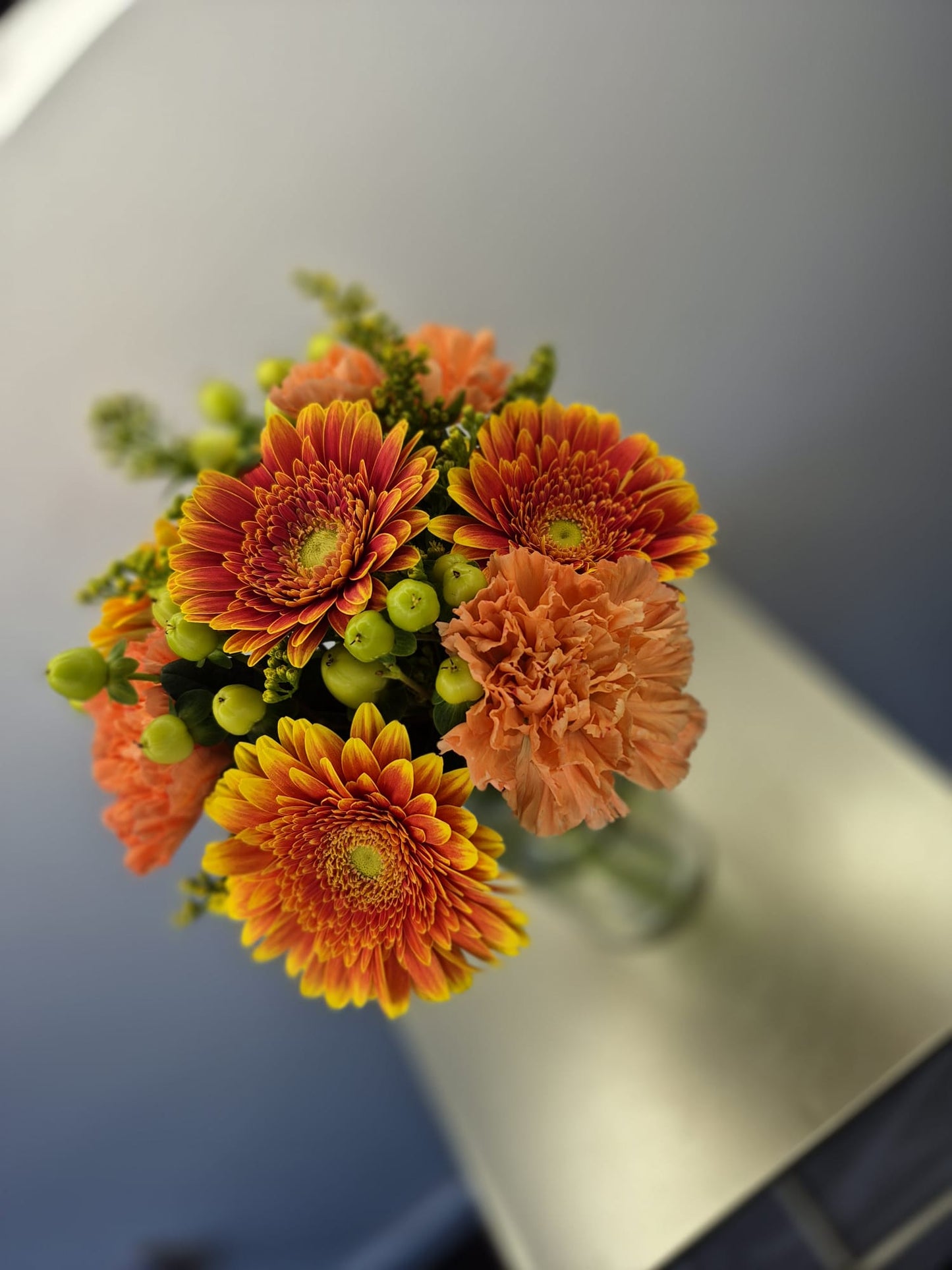 Set of 10 fresh table arrangements (vases included) £200