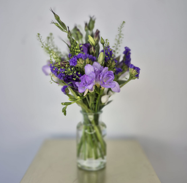 Set of 10 fresh table arrangements (vases included) £200
