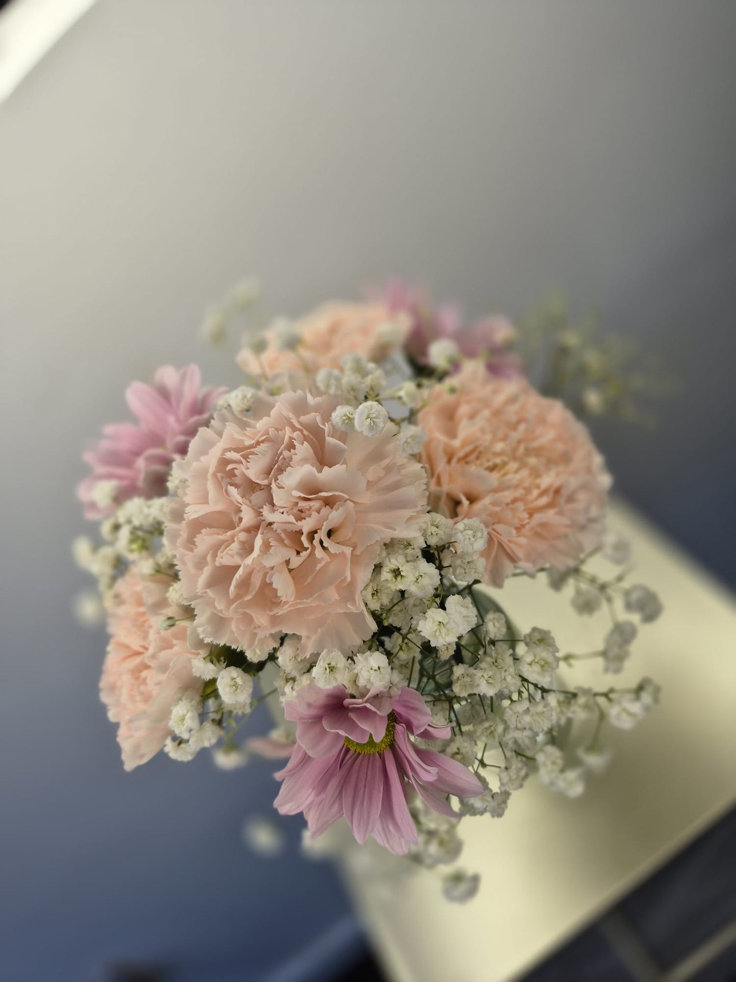 Set of 10 fresh table arrangements (vases included) £200
