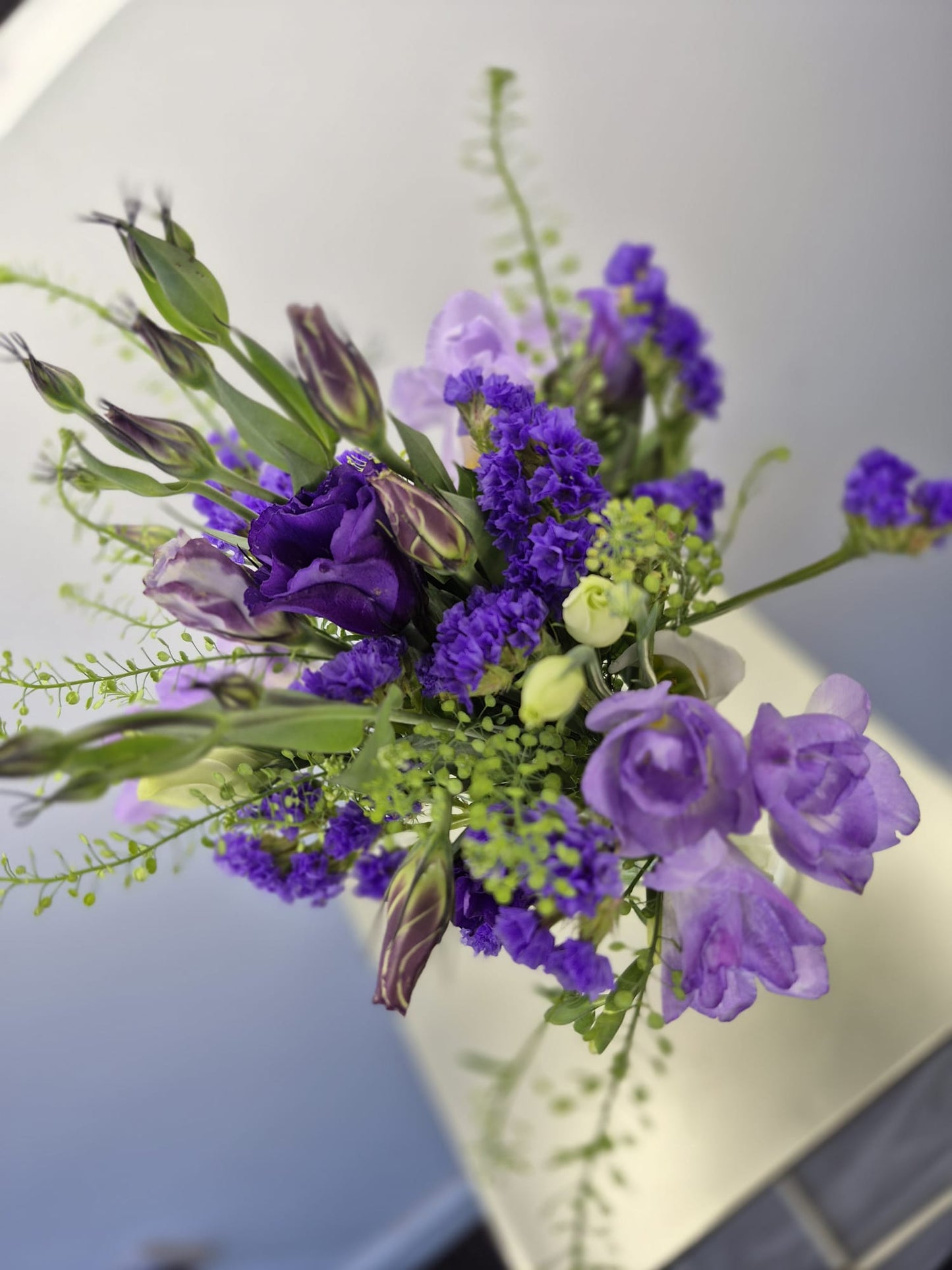 Set of 10 fresh table arrangements (vases included) £200
